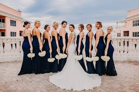 Navy and tartan plaid wedding party theme. Outdoor Rooftop Bridal Party Portrait Bridesmaids In Halter Navy Blue Column Lulu S Zenith Dresses Bride In
