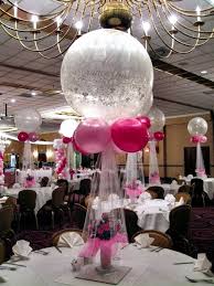 Elegant Table Centerpieces Let Your Tables Talk The Perfect Centerpiece Will Take Your Venue Wedding Balloons Balloon Centerpieces Balloons