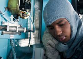 Yeoman Seaman Apprentice Darrell Lambert acts as the