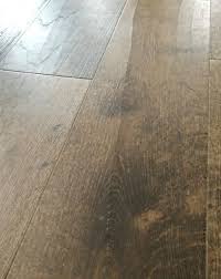 I was just about to pay for a company that is a subcontractor for costco to come and put in shaw wood laminate flooring throughout my house when i decided i better look through some reviews. Cracking Shaw Castlewood Oak Engineered