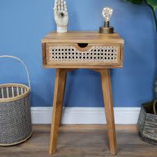 The previous owner had left a bed frame behind, but nothing else for the bedroom. Wood Cane 1 Drawer Bedside Table