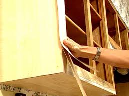 How often to clean kitchen cabinets. How To Reface Kitchen Cabinets With Veneer Video Hgtv