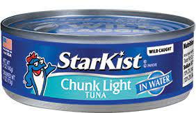 Cropped image of young woman is posing with skateboard in the city. Protein In Tuna Canned In Water