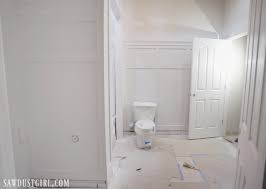 If you weren't able to get all the backing paper off when washing the walls, the sandpaper. Board And Batten Wainscoting In Basement Bathroom Sawdust Girl