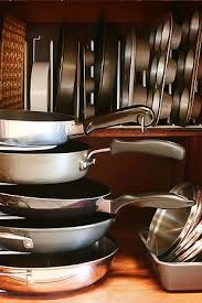 Use Pan Organizers Both Horizontally And Vertically To Maximize Storage Space In Your Kitchen Cabinets Kitchen Cabinet Organization Kitchen Organization Smart Kitchen