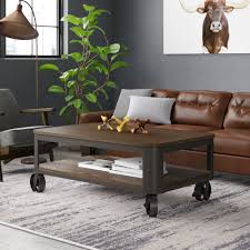 Industrial vintage coffee table with wheels by the orchard furniture, source: 17 Stories Emerico Lift Top Wheel Coffee Table With Storage Reviews Wayfair