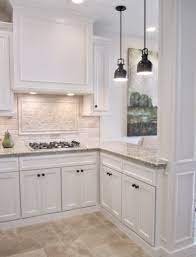 Splashes of color invigorate the entire kitchen. I Like The Backsplash Behind The Stove Here Antique White Kitchen Beige Kitchen Backsplash For White Cabinets