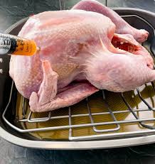 Be sure to really work the breast meat, as it tends to dry out during cooking. Cajun Spiced Roasted Turkey