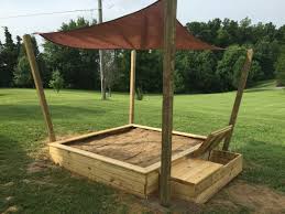 Praktische Sandkasten Idee Mit Sonnenschutz Spielzeugkasten Und Sitzbank Sandkasten Selber Bauen Sandkasten Ideen Sandkasten Bauen