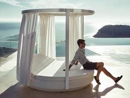 Maybe you would like to learn more about one of these? Vela Canopy Daybed Provides Sun Protection With Retractable Curtains