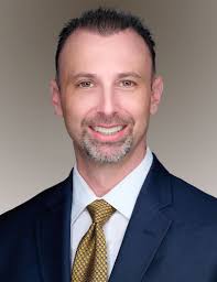 FORMER COMMISSIONERS