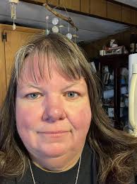 Hi all! I just wanted to introduce myself and share a photo I took well a  drawing I made of me taking a photo. I'm a compulsive reader and re-reader  and lover