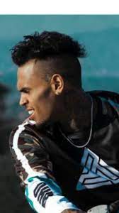 Chris Brown S Haircut Is Chris Brown Hair Chris Brown Long Brown Hair