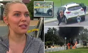 Horrifying moment mother pulls two children from her car seconds before it  burst into flames