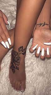 50 Beautiful Rose Tattoo Ideas Rose Tattoo Foot Foot Tattoos Foot Tattoo Ideas