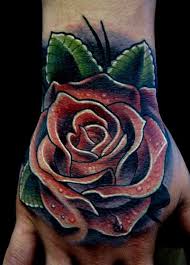 Simple grey rose tattoo on hand for men. Rose Tattoo For Men Ideas That Are Stunning And Cool To See Body Tattoo Art
