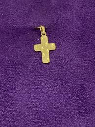 Use the provided polishing cloth to gently wipe this item clean, then remove any remaining tarnish with mild diluted soap. Ladies Small Gold Cross Pendant By Design Jewellers Killarney Mall
