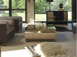 Beautiful tri level brass and glass swivel coffee table with lightly smoked glass coffee table with designer triangle base. Mirrored Glass Coffee Tables Archiproducts