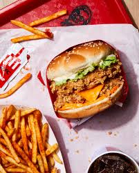 A burger with crunchy, juicy chicken fillet in a warm sesame bun, topped with fresh lettuce and creamy mayo. Kfc Home Facebook