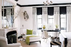 16 Stunning Black And White Rooms Elle Decor Bedroom Bedroom With Sitting Area Elle Decor