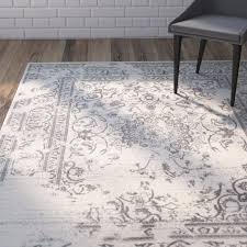 Here's a great gallery of 50 living rooms with carpet flooring that actually look fabulous. Costa Mesa Oriental Ivory Silver Area Rug Area Rugs Silver Area Rug Rugs