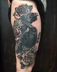With this in mind, the crow can also mean destiny and transformation, as many tattoos show a murder of crows transforming from an object (like a tree) into their true form. Crows And Roses Skull Rose Tattoos Tattoos Rose Tattoo Sleeve
