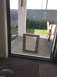 Cats are friendly, cute, and funny, but their love of climbing and need to sharpen their claws means they can wreak havoc on window and door you may need to protect your screens from scratches, or you might be worried that your. Screen Door With Pet Door Aussie Pet Doors