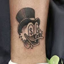 The number can be worn as a tattoo, but is normally found on flyers and letters. Money Sign Tattoo Best Money Tattoos Cool Money Bag Dollar Sign Cash Stack And Monopoly Man Mo Money Tattoo Money Tattoo Ideas For Men Money Tattoo Ideas