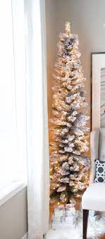 How To Set Up A Flocked Christmas Tree To Minimize Flock Shedding Flocked Christmas Trees Decorated Christmas Tree Decorating Themes Pencil Christmas Tree