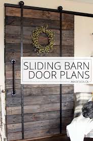 This sliding barn door tutorial is detailed with step by step instructions to build your own custom barn door for your home. Sliding Barn Door Plans
