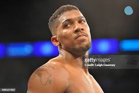 Anthony Joshua in the ring ahead of his fight against Gary Cornish... News  Photo