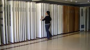 The base of this track is flush with the ceiling, allowing the doors to pass from floor to ceiling. Hume Doors