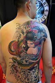 Koi is a japanese word that translates as carp and koi fish can also be referred to as cap fish. 90 Awesome Japanese Tattoo Designs Cuded Japanese Geisha Tattoo Japanese Tattoo Japanese Tattoo Designs