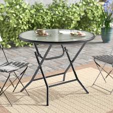 Ebern Designs Vargas Glass Bistro Table Reviews Wayfair In 2020 Wicker Dining Tables Metal Dining Table Wicker Coffee Table
