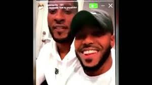 Gospel singer Darrel Walls kisses boyfriend