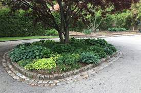Virginia continues to sell her work and the work of over 300 well known artists and craftsmen. Pin By Claire Vannette On Backyard Garden Pavers Garden Edging Driveway Landscaping