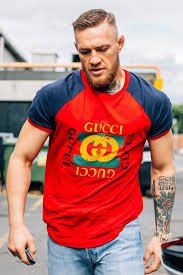 The Conor Mcgregor Look Book Gq 100% preshrunk cotton crew neck regular fit gildan t shirt.