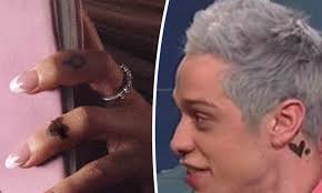 Singer ariana grande posted a new video of her tattoo with the correct spelling on instagram thursday. Ariana Grande And Pete Davidson Get Coordinating Post Break Up Tattoos Daily Mail Online