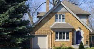 Brick&batten's designers turned these ranch. A North American Yellow Brick House In Early Summer Exterior Paint Colors For House Brick Exterior House House Exterior Color Schemes