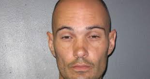 Man arrested after igniting bomb at car dealership