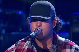 Top five american idol finalist caleb kennedy is leaving the show after a video surfaced of him sitting next to a friend in what looked like a ku klux klan hood. Caleb Kennedy Advances At Idol With A Gritty Country Original