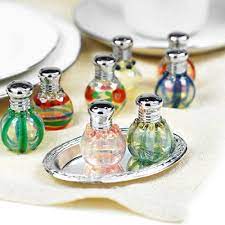 Mini Blown Glass Salt And Pepper Shakers Exceptionally clever, these salt and pepper shakers do double duty as not only shakers, but lights for your table as well.