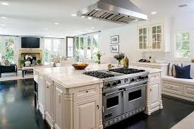 The addition of two chic pendant lighting over the kitchen island adds extra dimension and substance to the space. Kitchen Island With Viking Range Transitional Kitchen Kitchen Island With Cooktop Kitchen Island Dimensions Kitchen Remodel