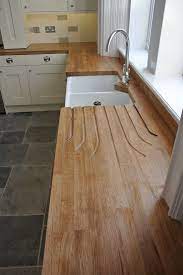 Saving you both time and money as worktops are delivered ready to fit. Cream Kitchen Black Floor Wooden Worktop Google Search Kitchen Design Diy Wood Worktop Kitchen Kitchen Design