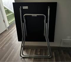 Super cute Brand New IKEA folding table and 2 chairs. Keep it up or fold it  down. Chairs stack but don't fold. 50$ for set Pick up in Moab