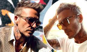 David beckham is a name which is still popular among football fans. David Beckham Models Shades From His Spring Summer 2021 Eyewear Collection Daily Mail Online