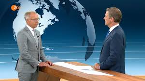 Eine person in schutzkleidung journalismus als parodie: Korte Zu Gast Im Zdf Heute Journal Es Verhalt Sich Wie Bei Mikado Wer Sich Zu Fruh Bewegt Verliert Professur Fur Politikwissenschaft An Der Universitat Duisburg Essen Im Fachgebiet Politisches System Der