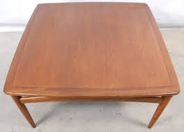 An artistic piece of modernism history doubling as a useful coffee table crafted of breathtaking solid american walnut. G Plan Teak Wood Large Square Coffee Table Sold