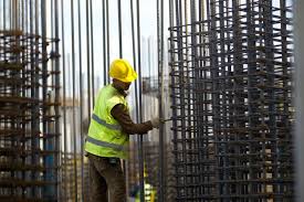 Download Working Hard Building Man Construction Worker For Free In 2020 Construction Worker Earthquake Retrofit Construction