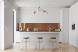 Images with hints for essential kitchen design is a simple to use app with which anyone can create beautiful and realistic kitchen. Modern White And Bronze Kitchen Interior With White Countertops Stock Photo Picture And Royalty Free Image Image 95655306